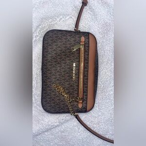 Michael kors should bag was my stepmoms but she wants me to sell it for her